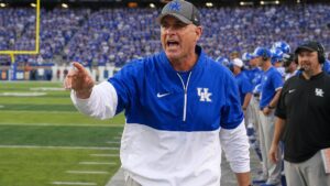 Kentucky Wildcats head coach on the sideline during the SEC opener against Alabama at Kroger Field