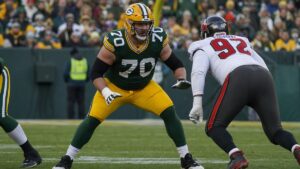 Kevin Zeitler blocking in a Green Bay Packers uniform