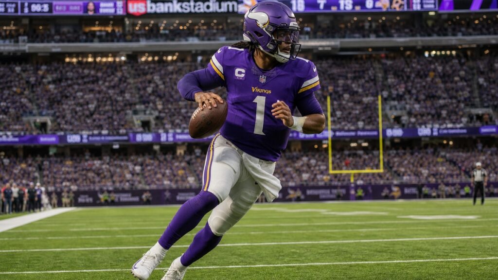 Kyler Murray scrambling in a Minnesota Vikings uniform during his debut against the Green Bay Packers