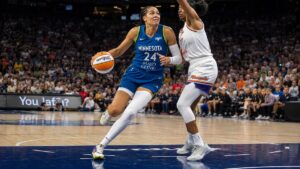 Napheesa Collier driving to the basket for the Minnesota Lynx in a WNBA playoff game