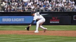 George Lombard Jr. fielding a ground ball at shortstop for the New York Yankees