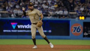 Xander Bogaerts fielding at shortstop for the San Diego Padres against the Los Angeles Dodgers