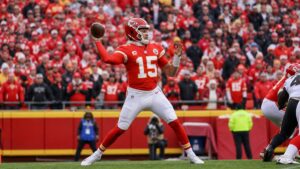 Patrick Mahomes throwing a pass for the Kansas City Chiefs at Arrowhead Stadium