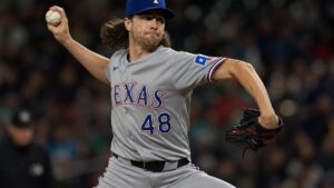 Jacob deGrom pitching for the Texas Rangers against the Seattle Mariners