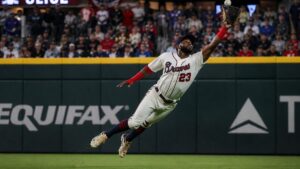 Michael Harris II making a diving catch for the Atlanta Braves