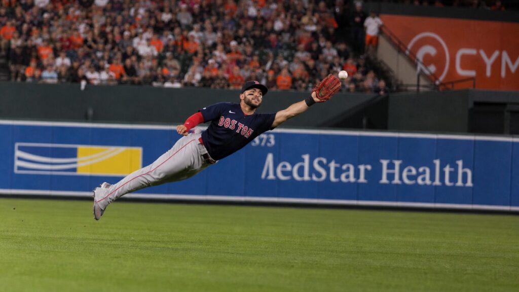 Wilyer Abreu making a diving catch in right field for the Boston Red Sox against the Baltimore Orioles