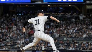 Cam Schlittler pitching for the New York Yankees against the Colorado Rockies