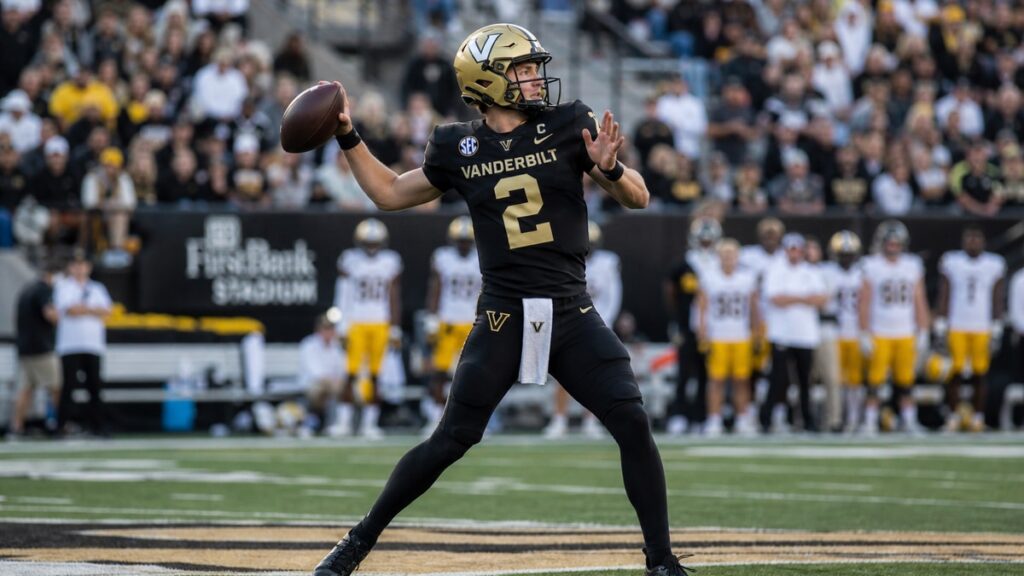 Vanderbilt quarterback Jared Curtis throwing a pass during a game at FirstBank Stadium