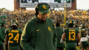Baylor Bears head football coach on the sideline at McLane Stadium after a close loss