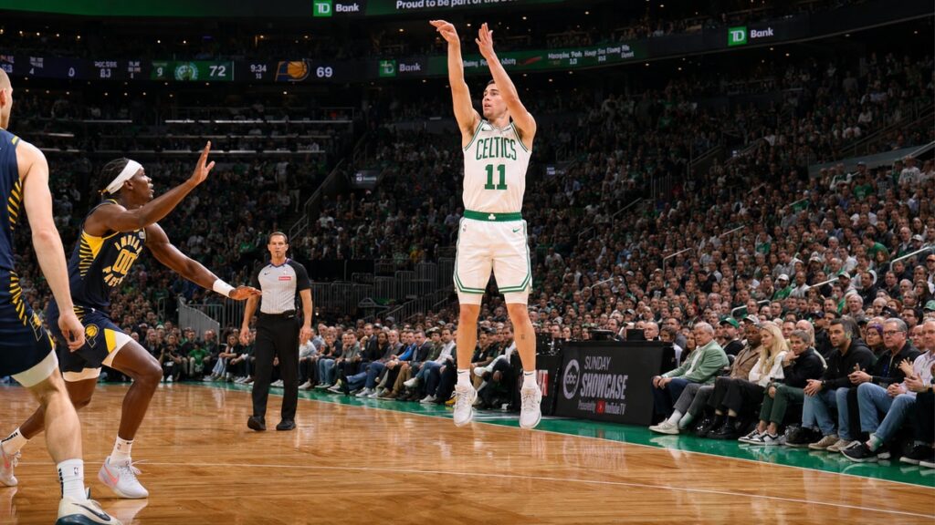 Payton Pritchard of the Boston Celtics shooting a three-pointer at TD Garden