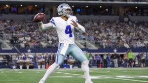 Dak Prescott throwing a pass for the Dallas Cowboys
