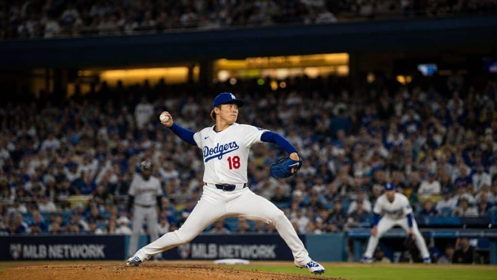Yoshinobu Yamamoto pitching for the Los Angeles Dodgers in NLCS Game 2 against the Milwaukee Brewers