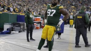 Javon Hargrave reacting on the sideline after suffering a torn Achilles injury for the Green Bay Packers