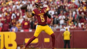 Jayden Daniels throwing a pass for the Washington Commanders