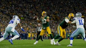Green Bay Packers quarterback Jordan Love dropping back to pass at Lambeau Field on Thursday Night Football