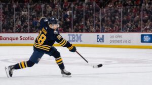 Josh Doan of the Buffalo Sabres taking a shot on goal