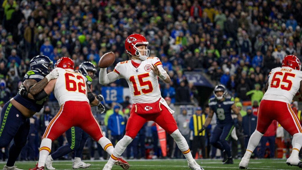 Patrick Mahomes of the Kansas City Chiefs dropping back to pass at Lumen Field