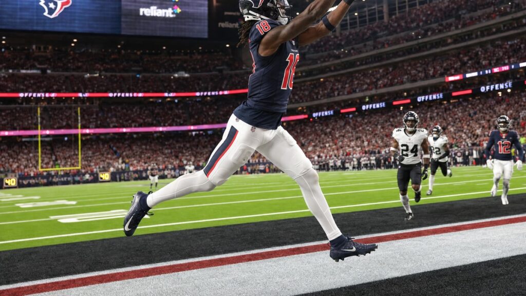 Marvin Harrison Jr. catching a pass for the Houston Texans