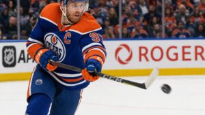 Connor McDavid of the Edmonton Oilers shooting the puck at Rogers Place