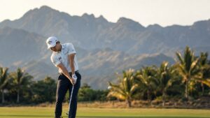 Doug Ghim hitting an iron approach shot at Vidanta Vallarta golf course in Mexico