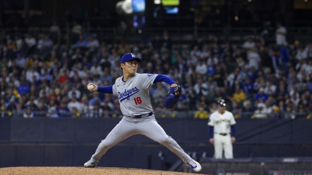 Yoshinobu Yamamoto pitching for the Los Angeles Dodgers during NLCS Game 2 against the Milwaukee Brewers