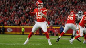 Patrick Mahomes of the Kansas City Chiefs dropping back to pass at Arrowhead Stadium