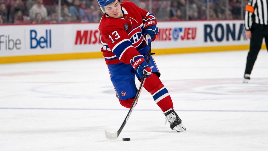 Cole Caufield of the Montreal Canadiens winding up for a shot in the offensive zone