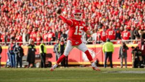 Patrick Mahomes throwing a pass for the Kansas City Chiefs at Arrowhead Stadium