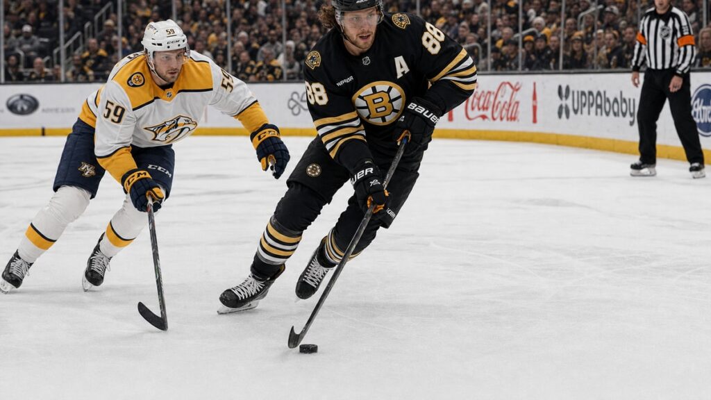 David Pastrnak of the Boston Bruins skating with the puck against the Nashville Predators at TD Garden