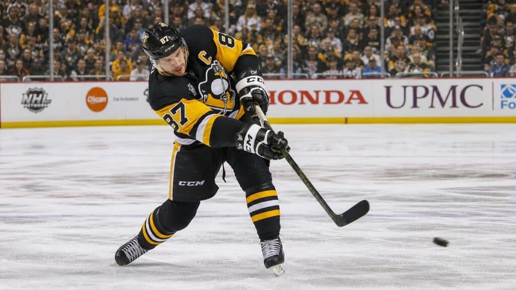 Sidney Crosby shooting the puck for the Pittsburgh Penguins