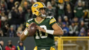 Green Bay Packers quarterback Jordan Love dropping back to pass at Lambeau Field